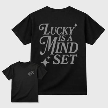 Lucky Is a Mindset graphic t-shirt styled to complete your sneaker outfit with the 6s Cap&Gown, shown in Black.