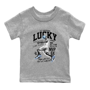 Lucky Player baby and kids t-shirt crafted for little sneakerheads to shine with the Air Foamposite One Psychic Blue sneakers, displayed in Heather Grey 2.