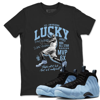 Lucky Player sneaker match t-shirt styled to complete your fit with the Air Foamposite One Psychic Blue sneakers, shown in Black 1.