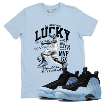 Lucky Player sneaker match t-shirt styled to complete your fit with the Air Foamposite One Psychic Blue sneakers, shown in Light Blue 1.
