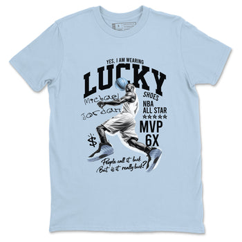 Lucky Player sneaker match t-shirt styled to complete your fit with the Air Foamposite One Psychic Blue sneakers, shown in Light Blue 2.