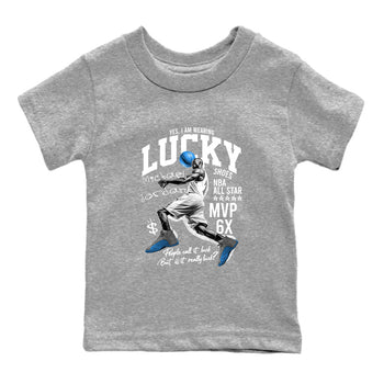 Lucky Player baby and kids t-shirt crafted for little sneakerheads to shine with the Air Jordan 12 White and University Blue sneakers, displayed in Heather Grey 2.