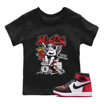 Manifest Money baby and kids t-shirt crafted for little sneakerheads to shine with the Air Jordan 1 Ruby sneakers, displayed in Black 1.