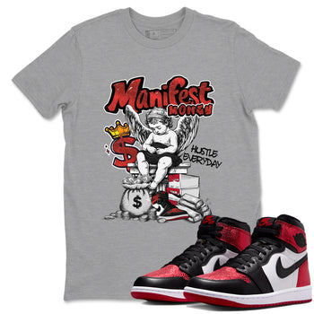 Manifest Money sneaker match t-shirt styled to complete your fit with the Air Jordan 1 Ruby sneakers, shown in Heather Grey 1.