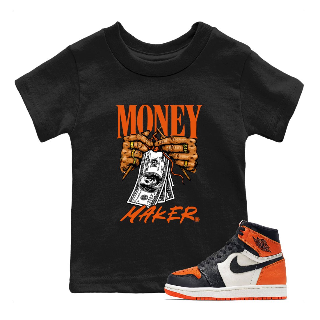 Money Maker baby and kids t-shirt crafted for little sneakerheads to shine with the Air Jordan 1 Shattered Backboard sneakers, displayed in Black 1.