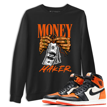 Money Maker sneaker match t-shirt styled to complete your fit with the Air Jordan 1 Shattered Backboard sneakers, shown in Black 1.