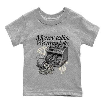 Sneaker Threads – Sneaker Tees To Match Air Foamposite One Pearl – Money Talks We Translate Youth Graphic Tee Heather Grey 2. Perfect for Jordan releases 2025 colorways.