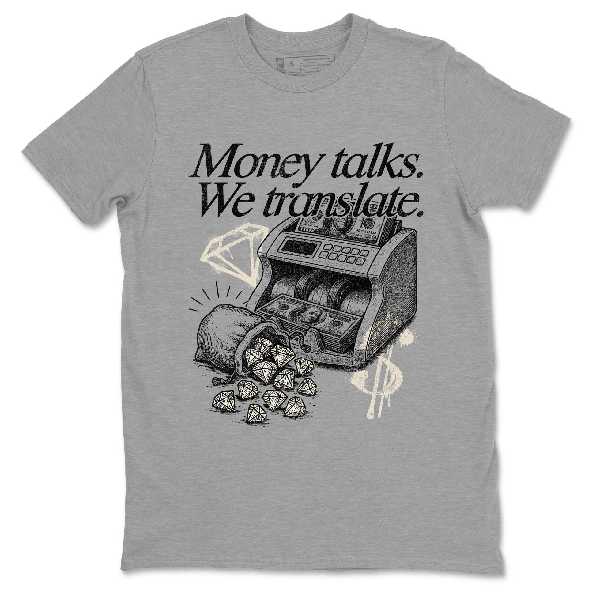 Sneaker Threads – Sneaker Tees To Match Air Foamposite One Pearl – Money Talks We Translate Graphic Tee Heather Grey 2. Perfect for Jordan releases 2025 colorways.