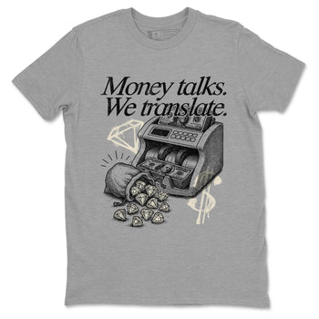 Sneaker Threads – Sneaker Tees To Match Air Foamposite One Pearl – Money Talks We Translate Graphic Tee Heather Grey 2. Perfect for Jordan releases 2025 colorways.