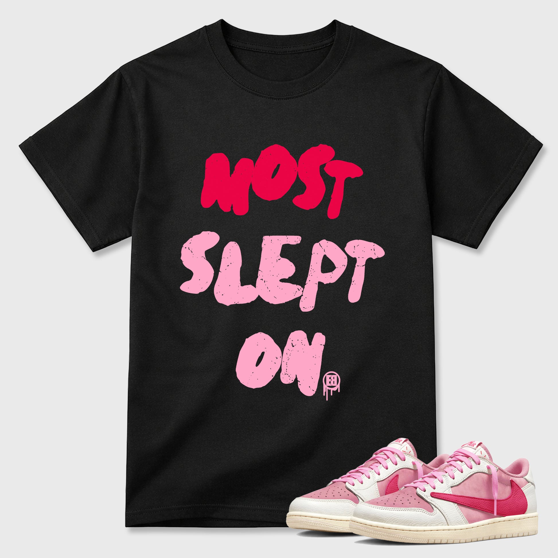 Most Slept On Graphic T-Shirt sneaker match tee designed for the Air Jordan 1 Travis Scott Tropical Pink, featuring coordinated color options for a perfect streetwear match. Black 1 shirt.