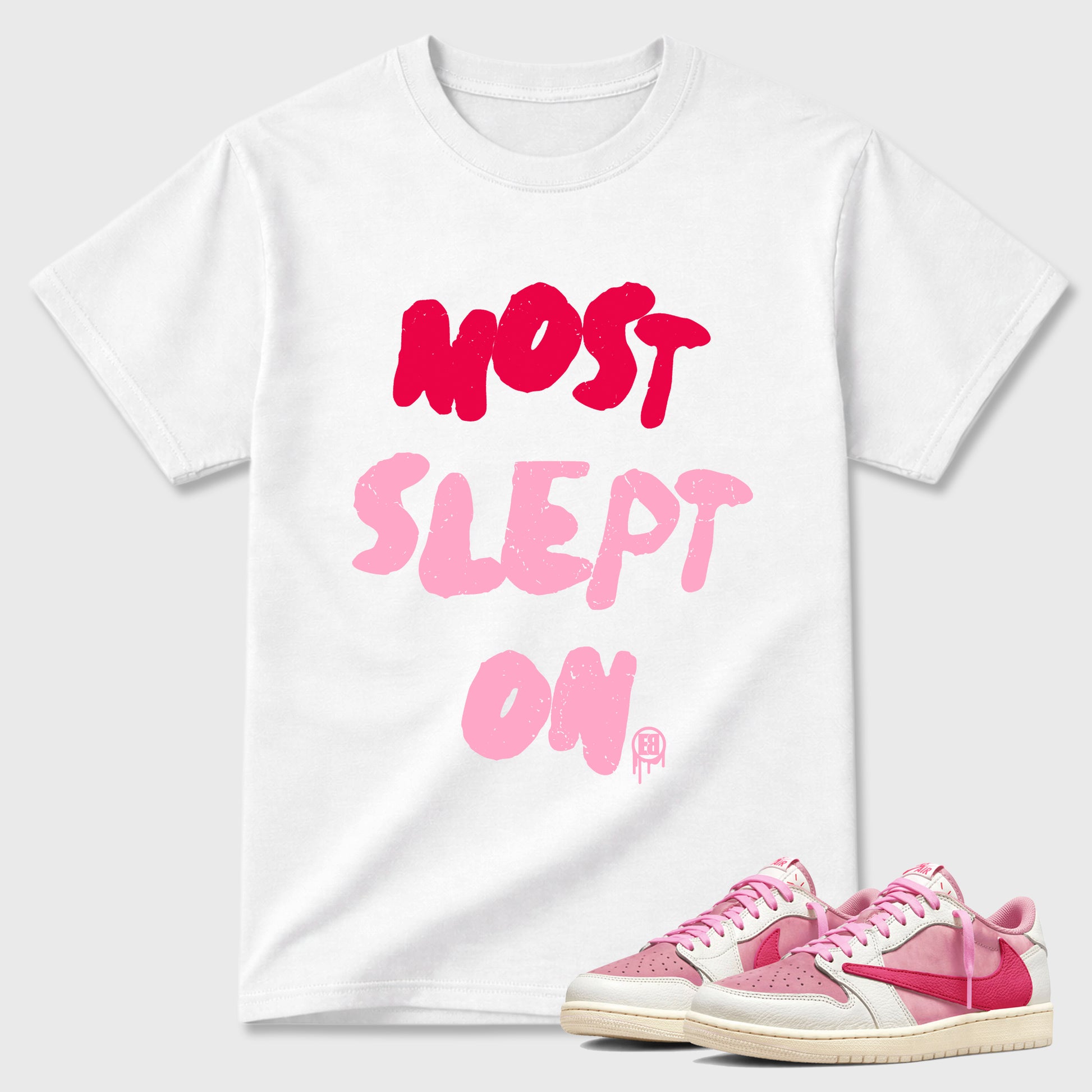 Most Slept On Graphic T-Shirt sneaker match tee designed for the Air Jordan 1 Travis Scott Tropical Pink, featuring coordinated color options for a perfect streetwear match. White 1 shirt.