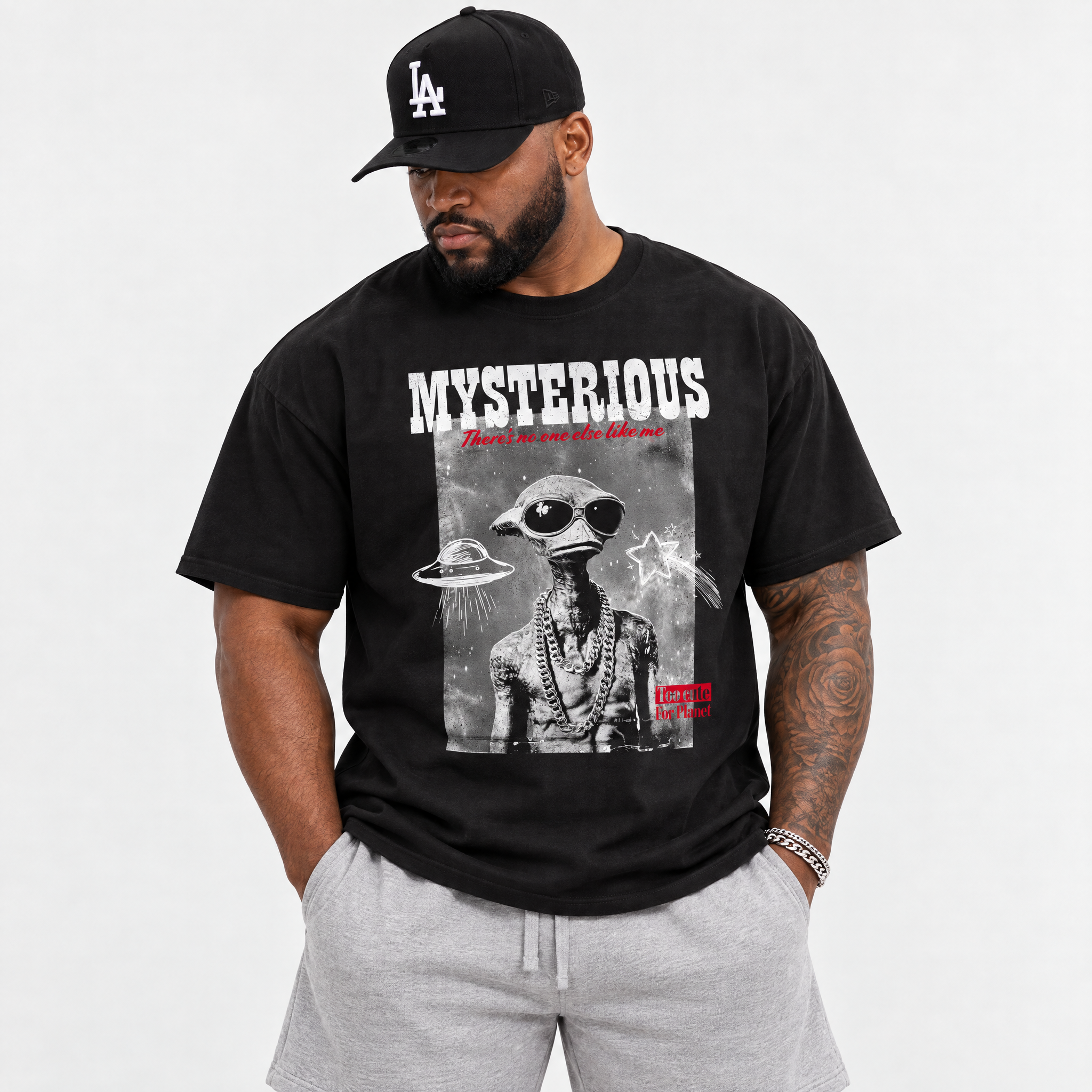 Mysterious Dude Graphic T-Shirt featuring original streetwear artwork designed to match the Air Jordan 9 True Red. Black 1 Graphic T-Shirt.