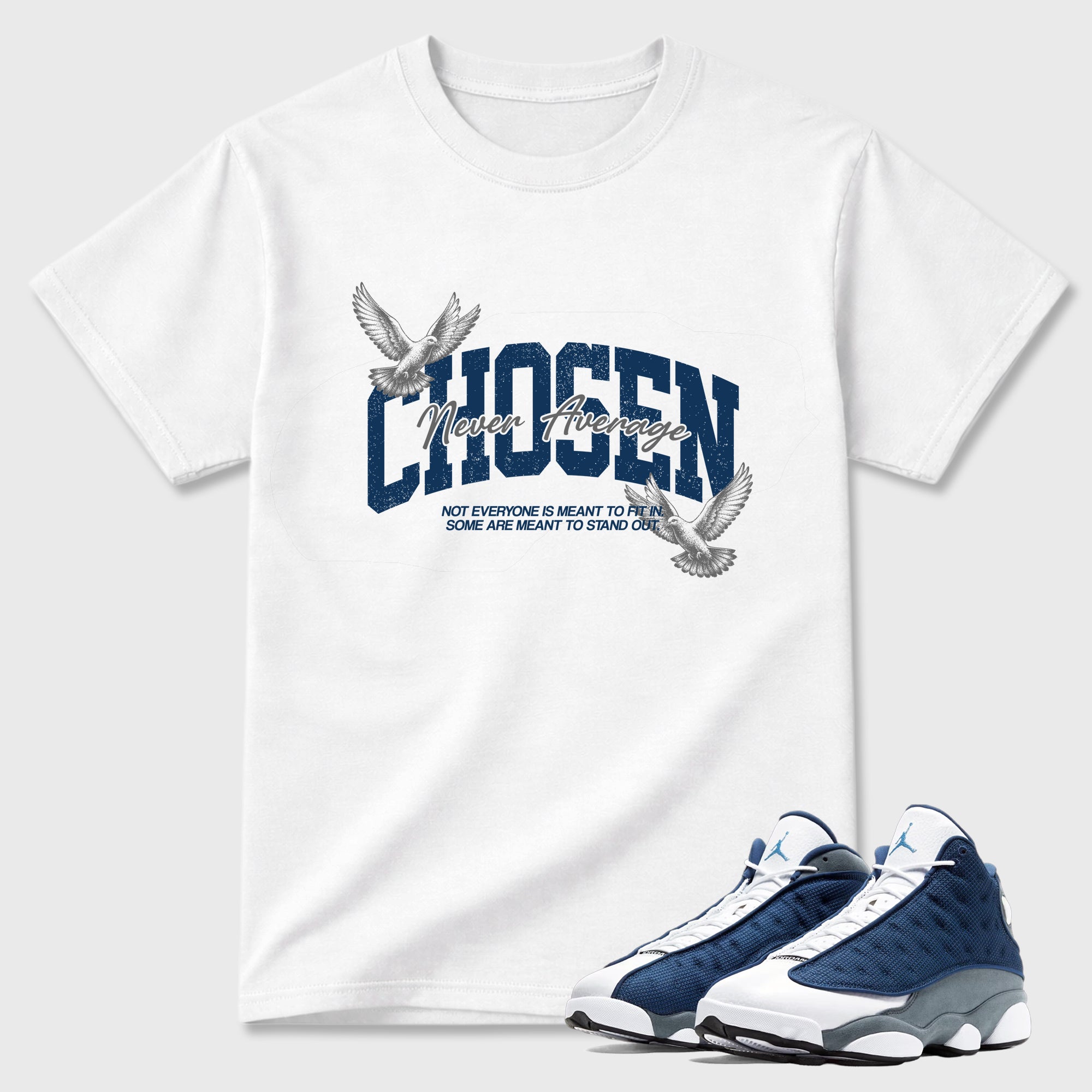 Never Average Graphic T-Shirt featuring original streetwear artwork designed to match the Air Jordan 13 Flint. White 1 Graphic T-Shirt.