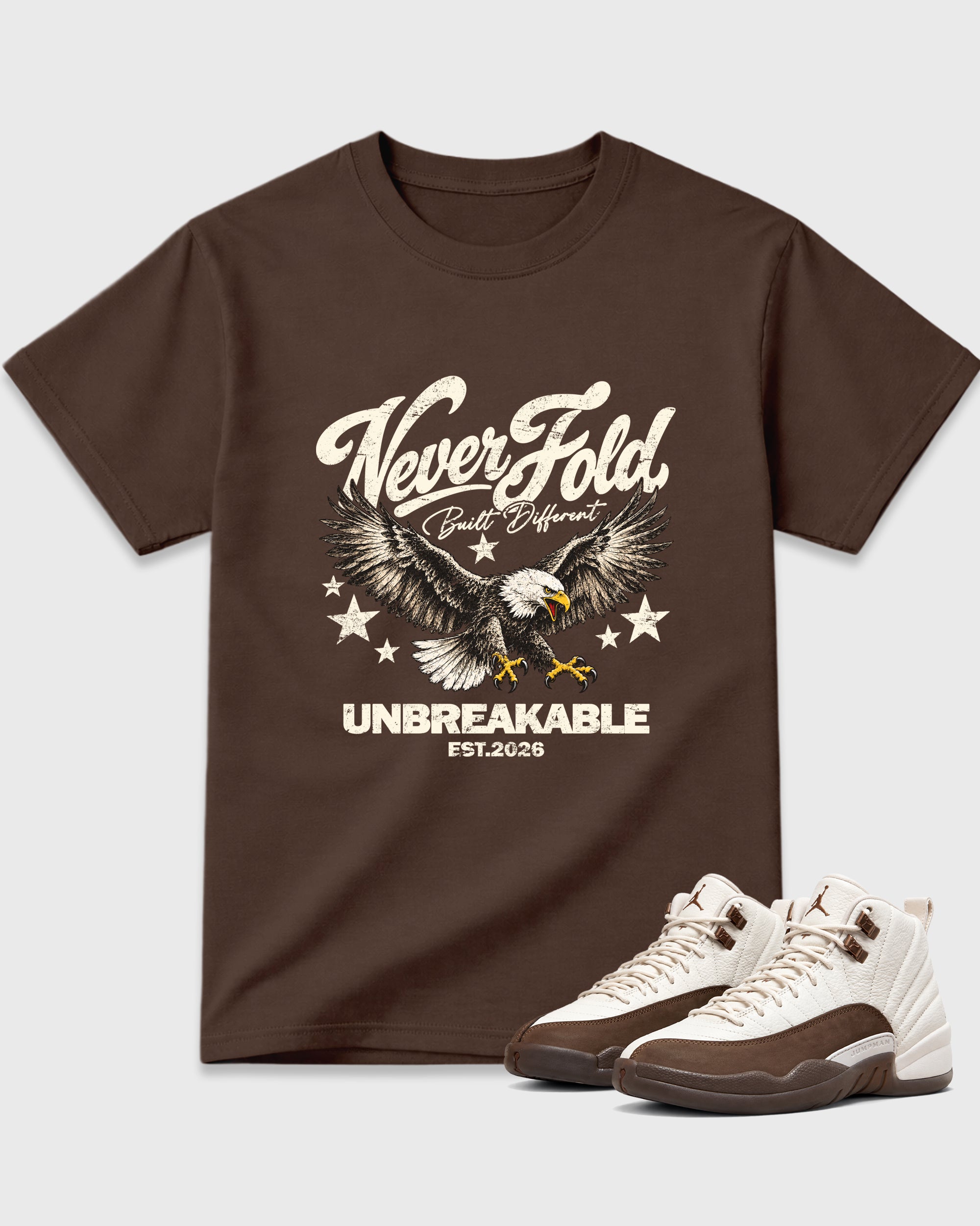 Never Fold Graphic T-Shirt featuring original streetwear artwork designed to match the Air Jordan 12 Fireside. Dark Chocolate 1 Graphic T-Shirt.