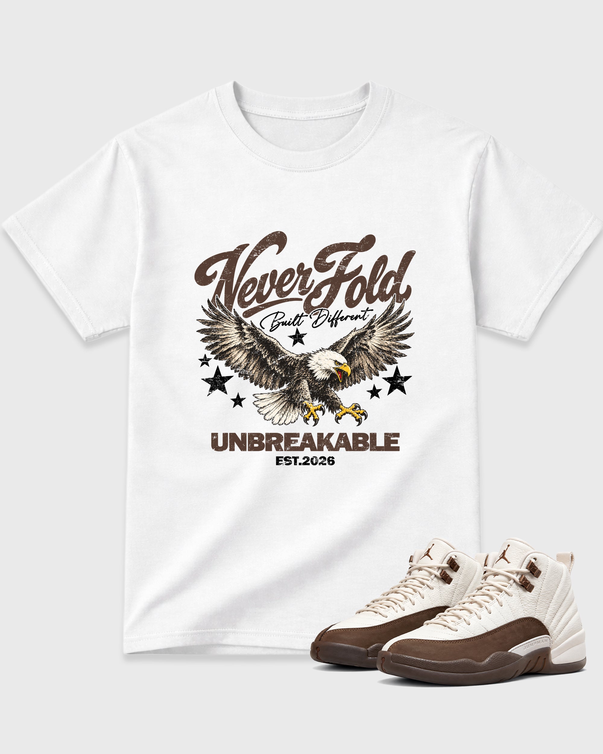 Never Fold Graphic T-Shirt featuring original streetwear artwork designed to match the Air Jordan 12 Fireside. White 1 Graphic T-Shirt.
