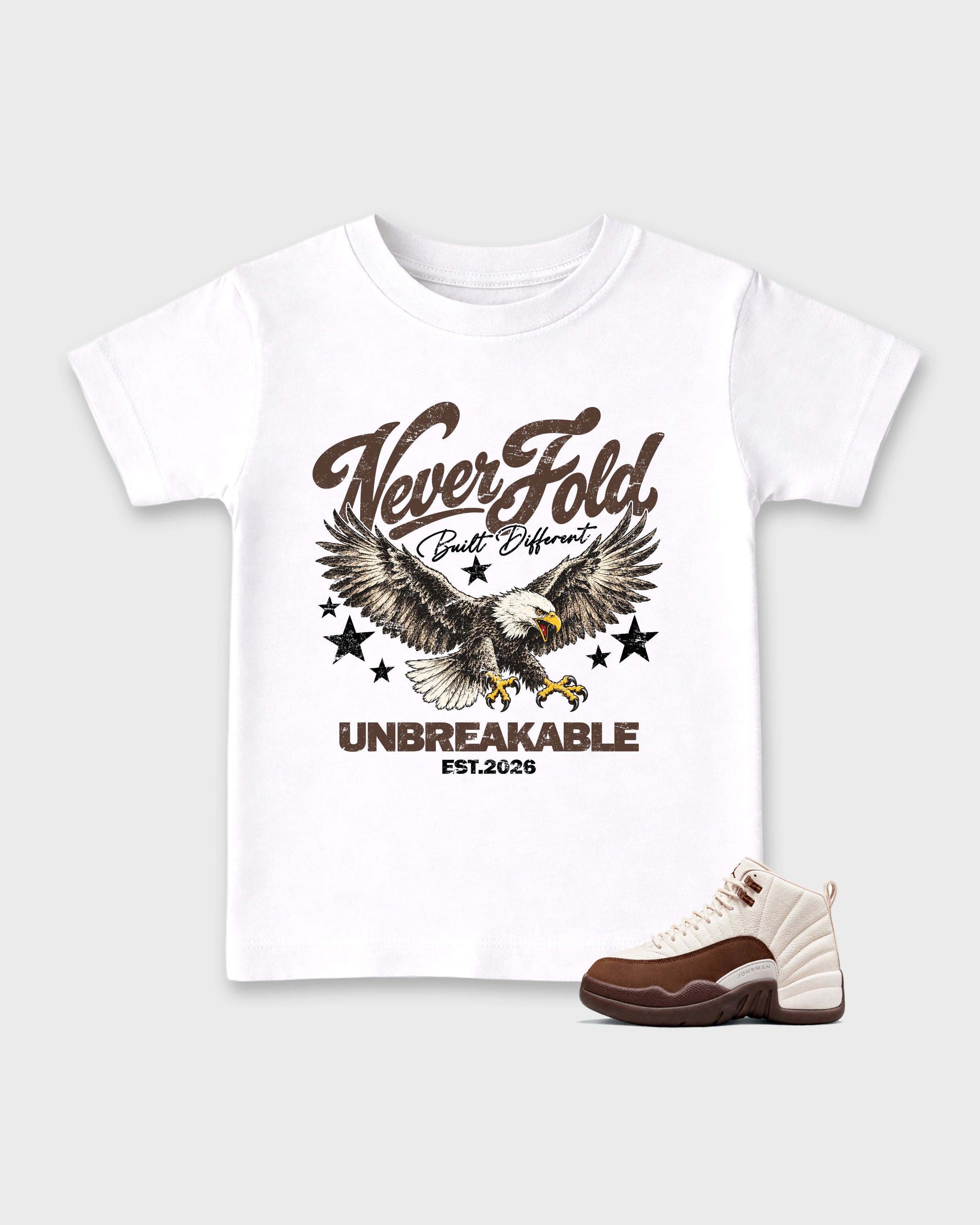 Never Fold Baby & Kids Graphic T-Shirt featuring original artwork designed to match the Air Jordan 12 Fireside. White 1 Kids Graphic Tee.