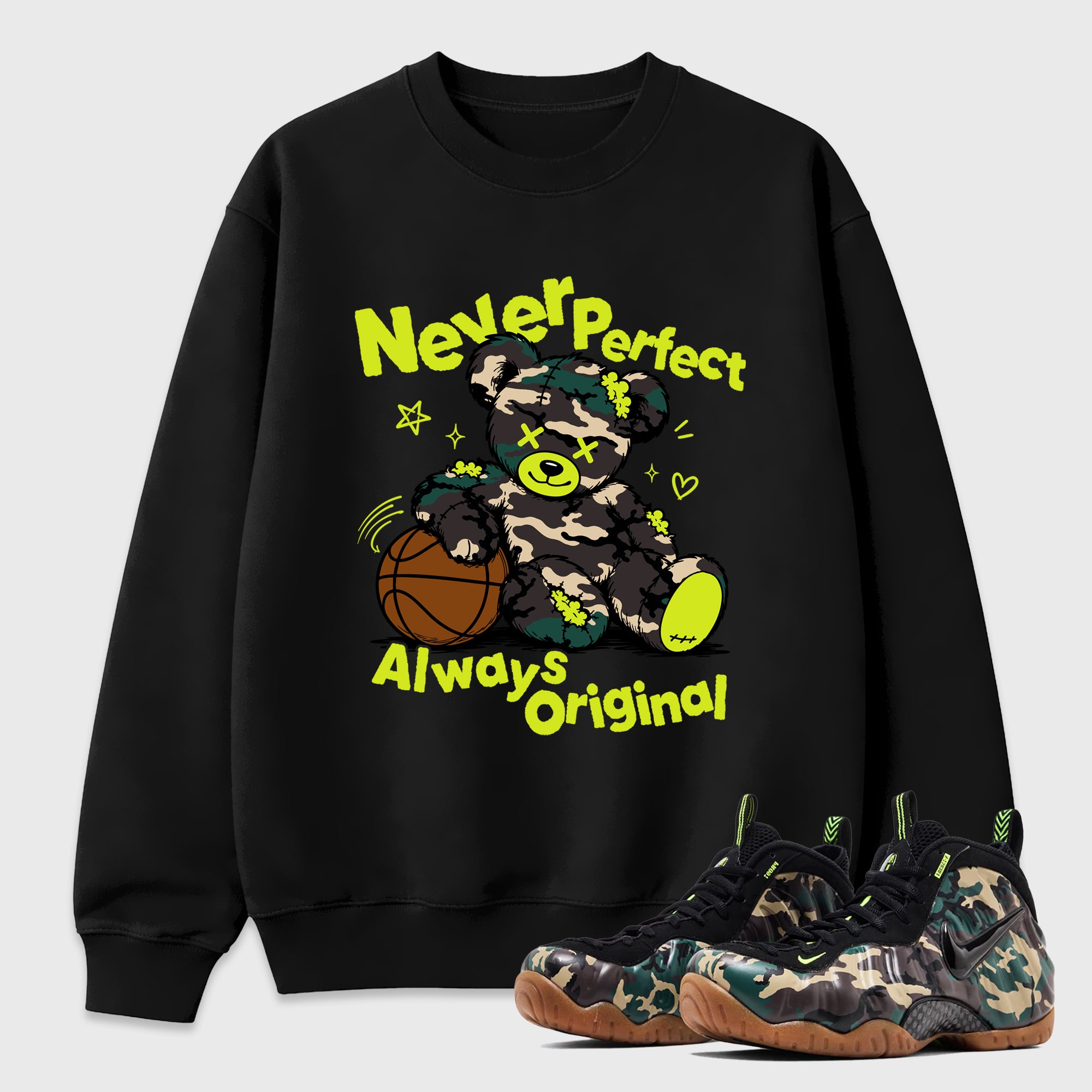 Never Perfect Always Original Graphic T-Shirt featuring original streetwear artwork designed to match the Air Foamposite Pro Green Camo. Black 1 Graphic Tee.
