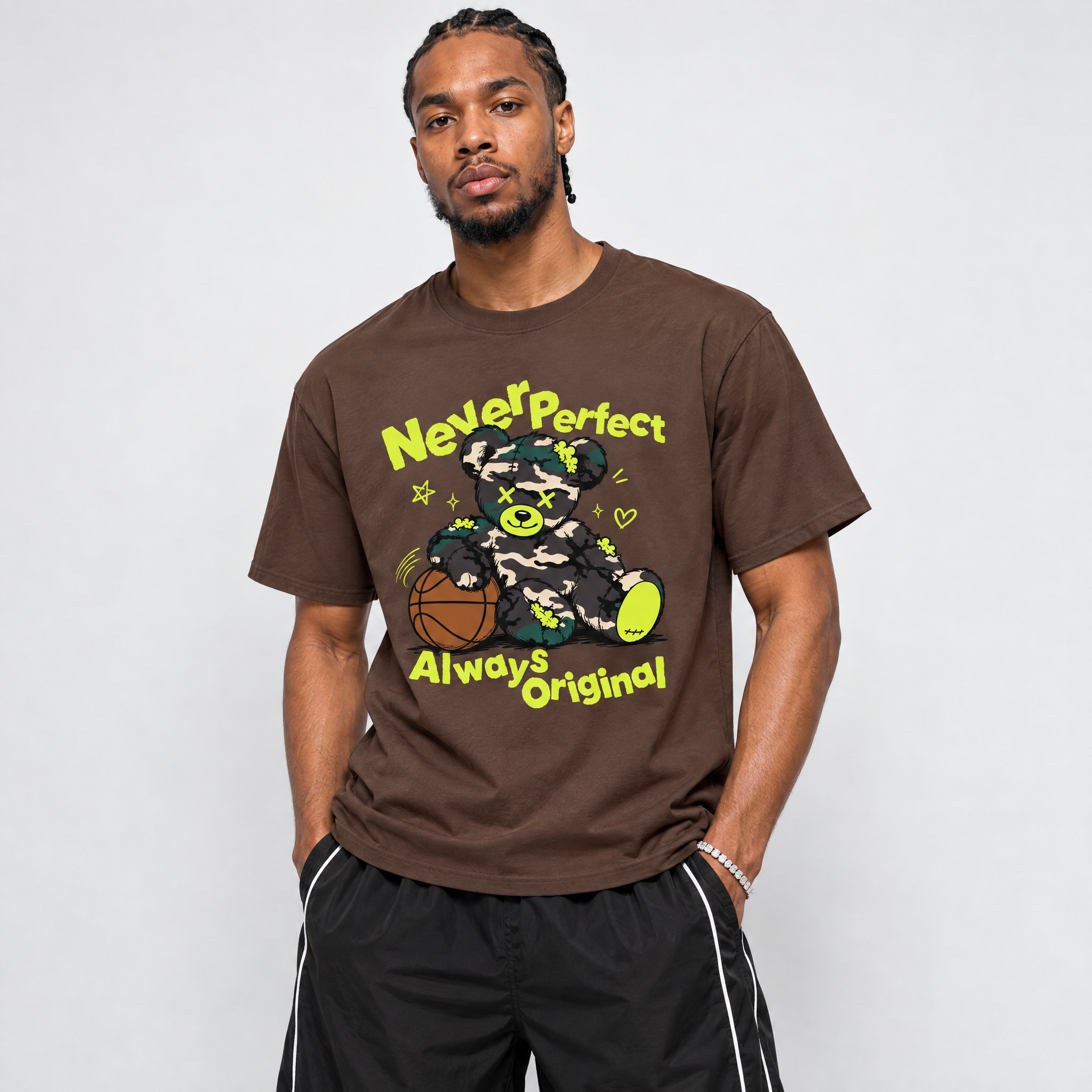 Never Perfect Always Original Graphic T-Shirt featuring original streetwear artwork designed to match the Air Foamposite Pro Green Camo. Dark Chocolate 1 Graphic T-Shirt.