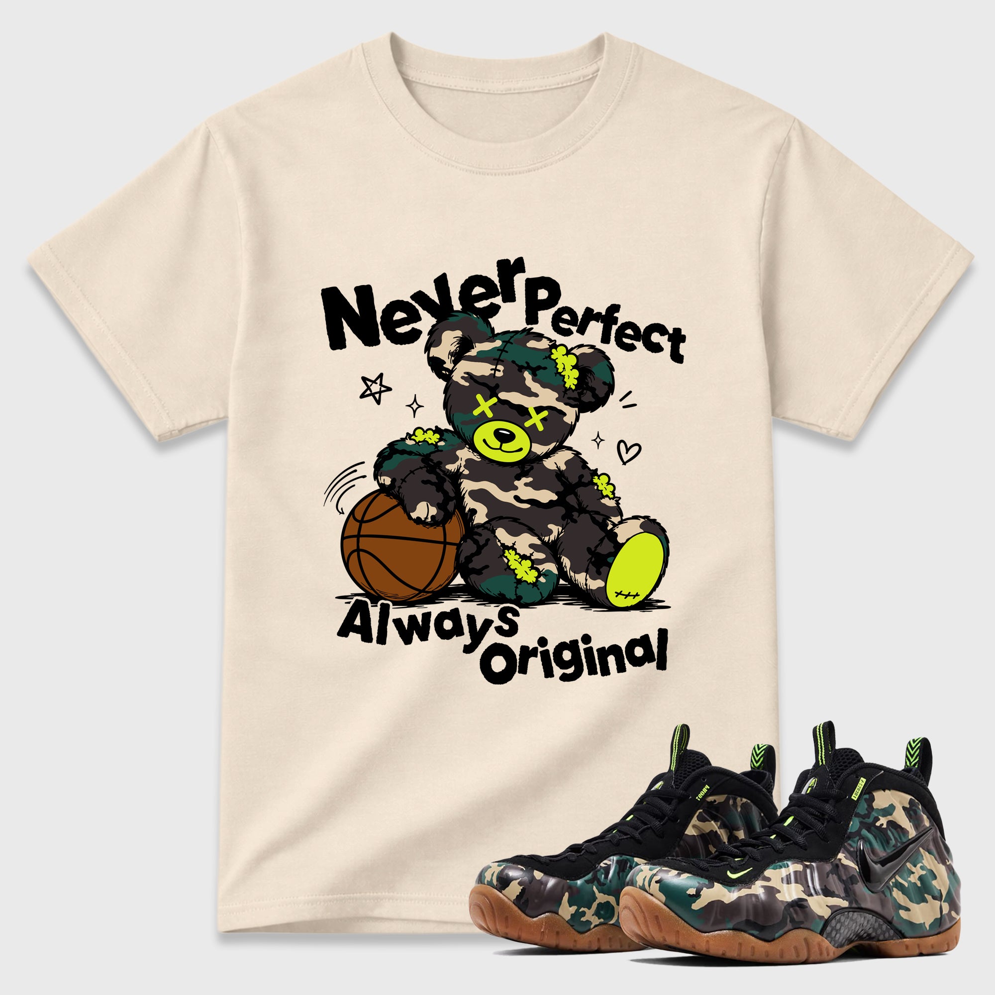 Never Perfect Always Original Graphic T-Shirt featuring original streetwear artwork designed to match the Air Foamposite Pro Green Camo. Natural 1 Graphic T-Shirt.