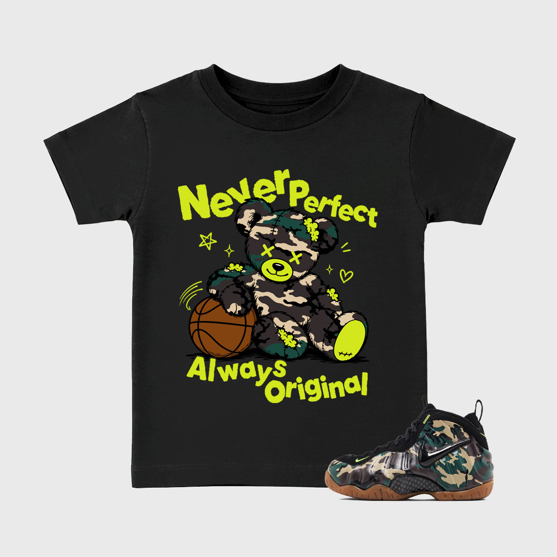 Never Perfect Always Original Baby & Kids Graphic T-Shirt featuring original artwork designed to match the Air Foamposite Pro Green Camo. Black 1 Kids Graphic Tee.