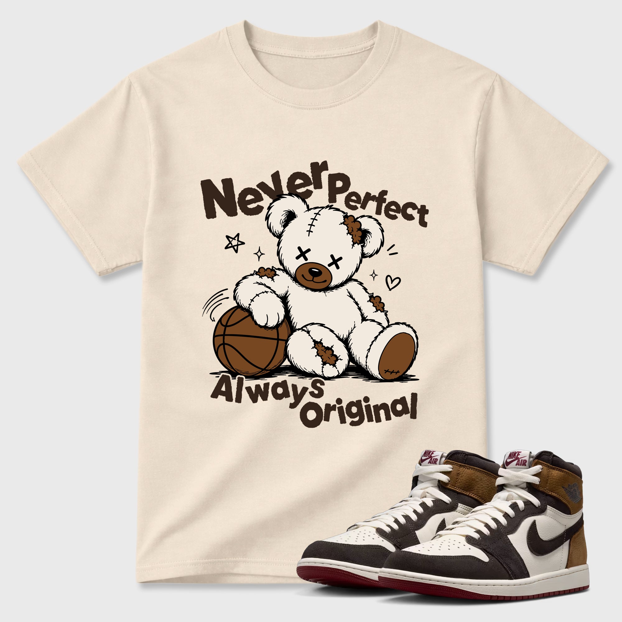 Never Perfect Always Original Graphic T-Shirt featuring original streetwear artwork designed to match the Air Jordan 1 Love Letter. Natural 1 Graphic T-Shirt.