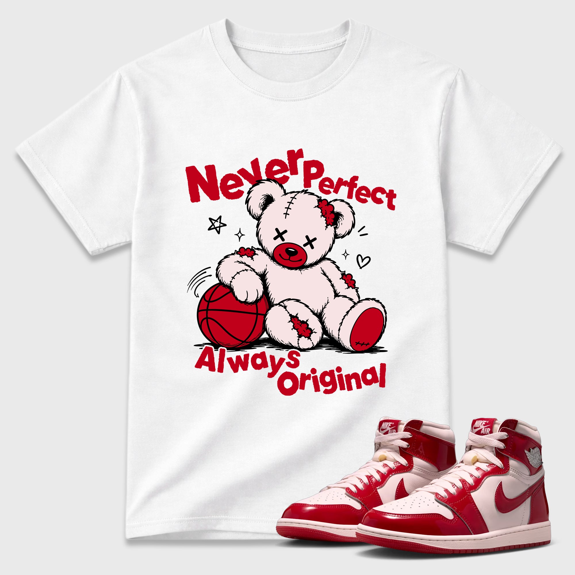 Never Perfect Always Original Graphic T-Shirt featuring original streetwear artwork designed to match the Air Jordan 1 Nails and Grails. White 1 Graphic T-Shirt.