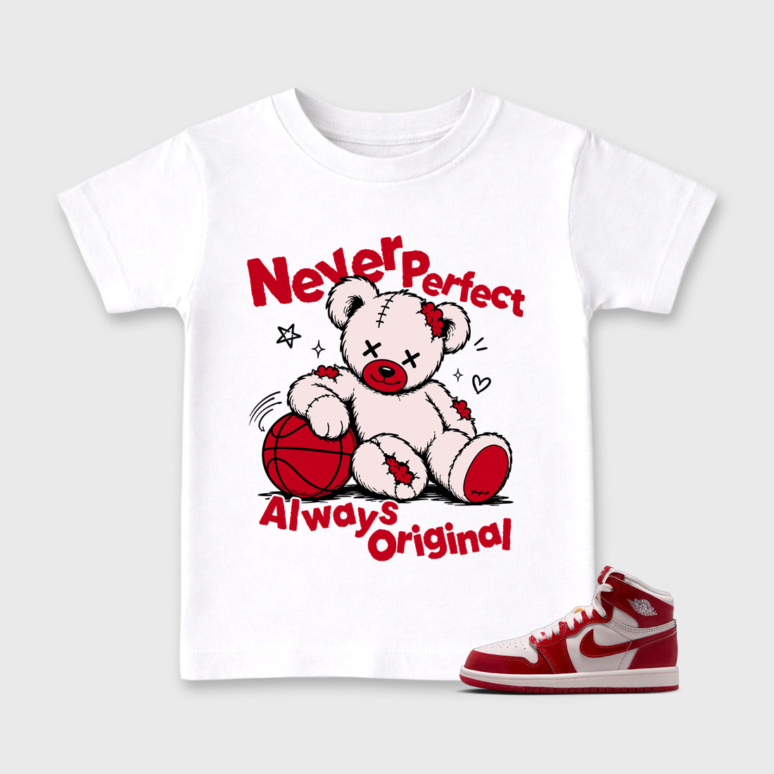 Never Perfect Always Original Baby & Kids Graphic T-Shirt featuring original artwork designed to match the Air Jordan 1 Nails and Grails. White 1 Kids Graphic Tee.