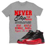 12s Flu Game shirts to match jordans Never Stop The Hustle best t shirts to wear with jordans Air Jordan 12 Retro Flu Black and Varsity Red match shoes to clothes SNRT Sneaker Tees unisex cotton Heather Grey 1 shirts