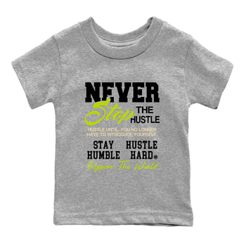 Never Stop The Hustle baby and kids t-shirt crafted for little sneakerheads to shine with the Jordan Jumpman Jack Travis Scott Bright Cactus sneakers, displayed in Heather Grey 2.