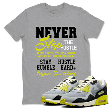Never Stop The Hustle sneaker match t-shirt styled to complete your fit with the Air Max 90 Cyber sneakers, shown in Heather Grey 1.