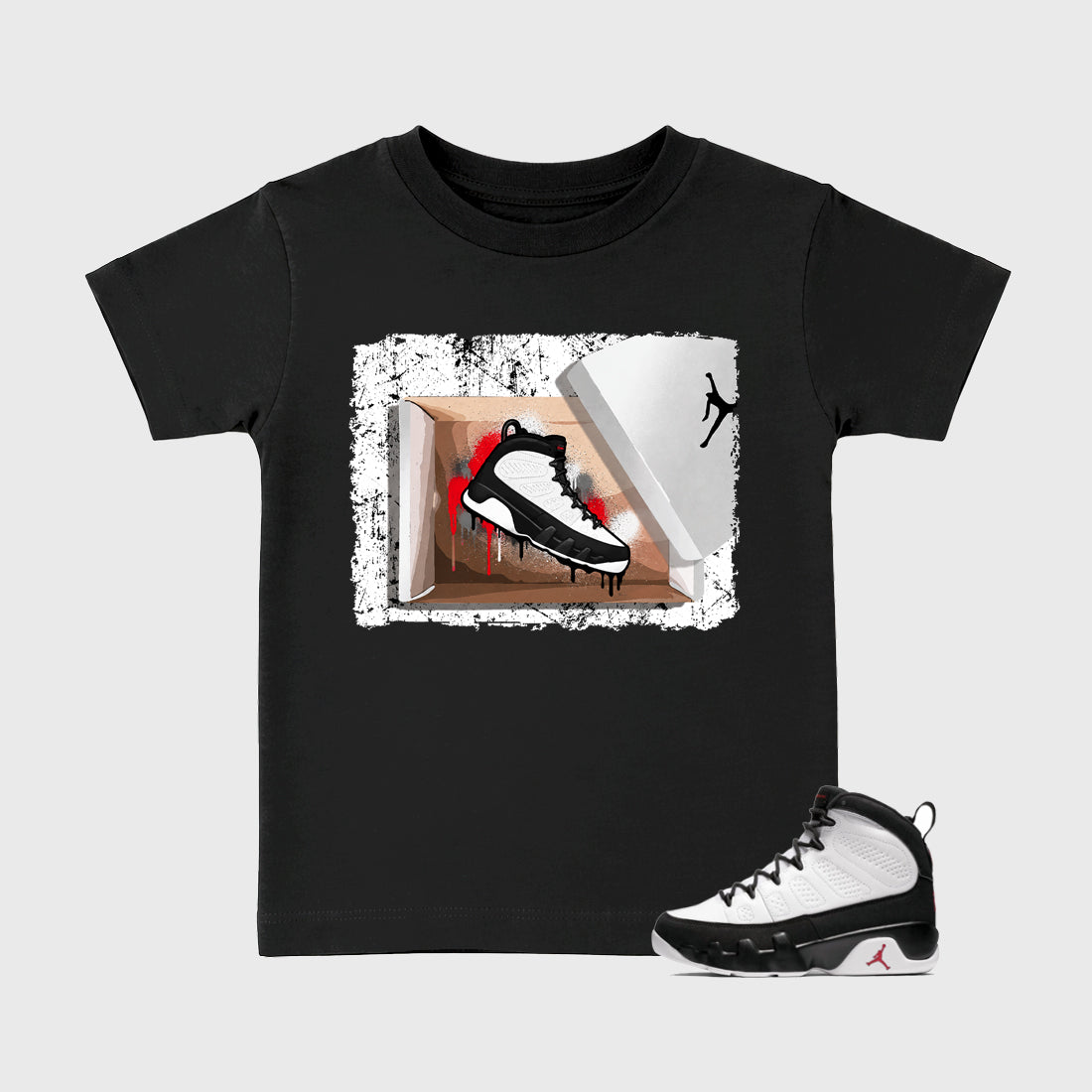 New Kicks Baby & Kids Graphic T-Shirt featuring original artwork designed to match the Air Jordan 9 True Red. Black 1 Kids Graphic Tee.
