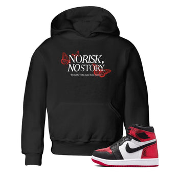No Risk No Story baby and kids t-shirt crafted for little sneakerheads to shine with the Air Jordan 1 Ruby sneakers, displayed in Black 1.