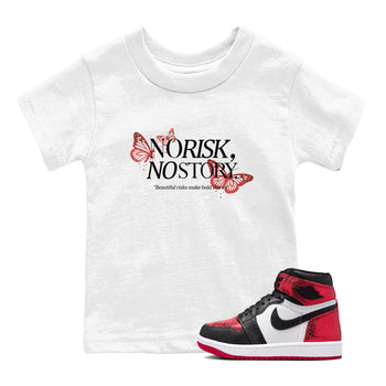 No Risk No Story baby and kids t-shirt crafted for little sneakerheads to shine with the Air Jordan 1 Ruby sneakers, displayed in White 1.