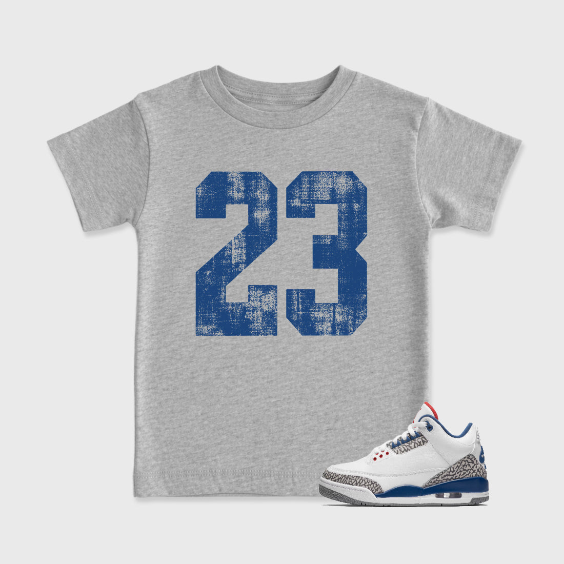 No.23 Baby & Kids Graphic T-Shirt featuring original artwork designed to match the Air Jordan 3 True Blue. Heather Grey 1 Kids Graphic Tee.