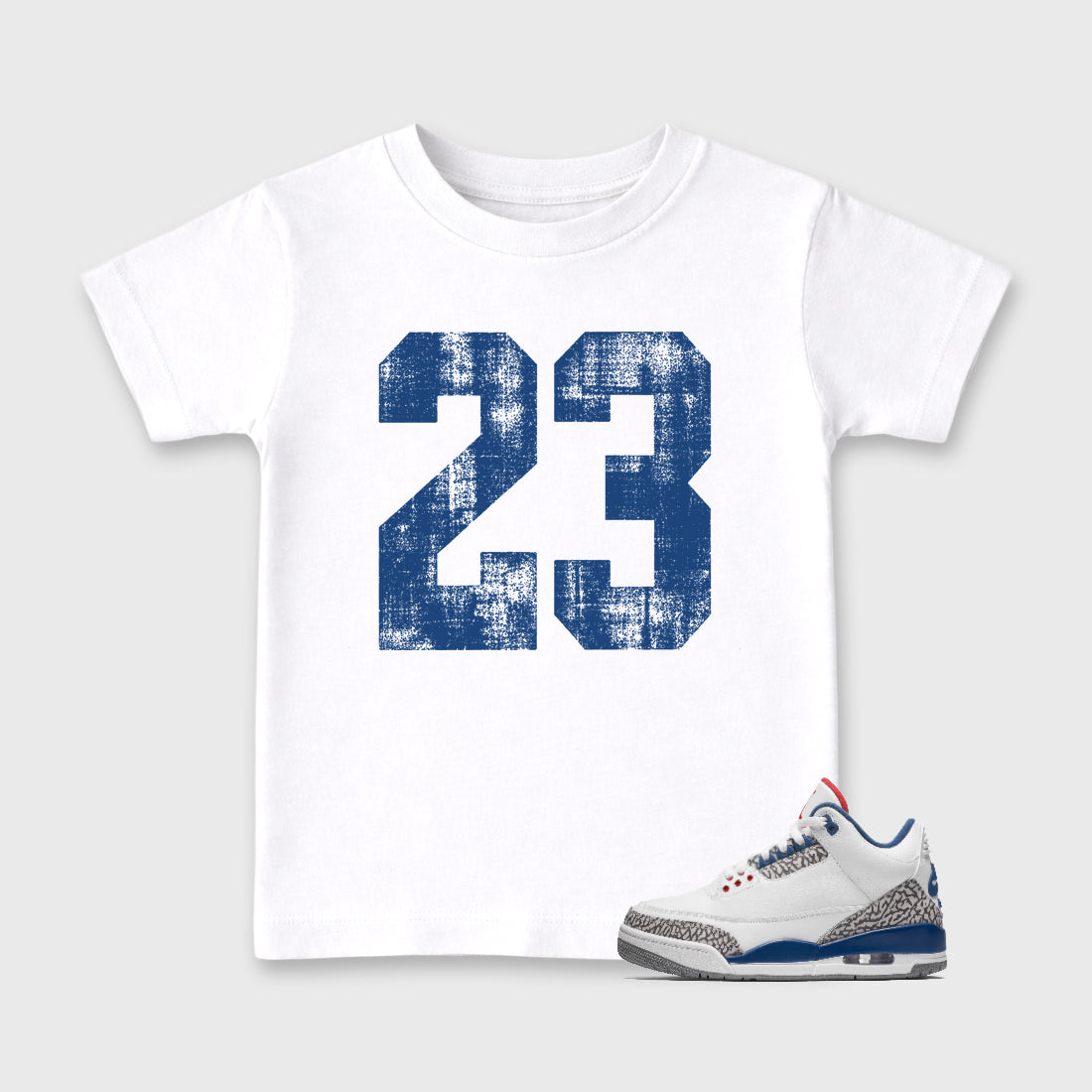 No.23 Baby & Kids Graphic T-Shirt featuring original artwork designed to match the Air Jordan 3 True Blue. White 1 Kids Graphic Tee.