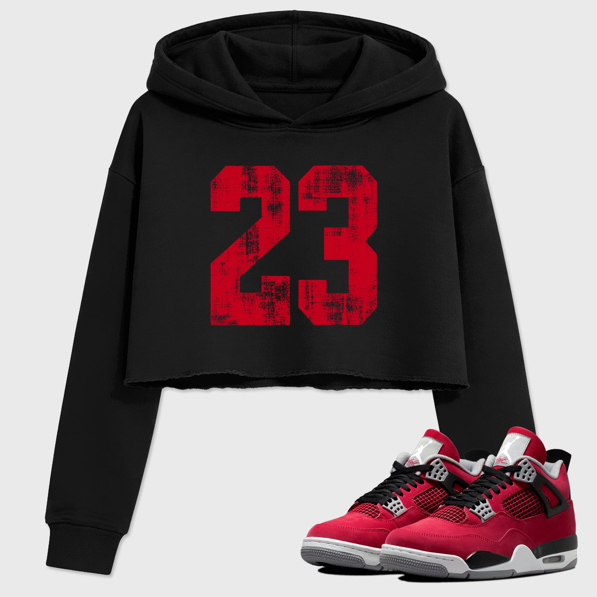 No.23 women’s crop tee designed to match the Air Jordan 4 Toro Bravo, featuring coordinated Black 1 options for a perfect streetwear vibe.
