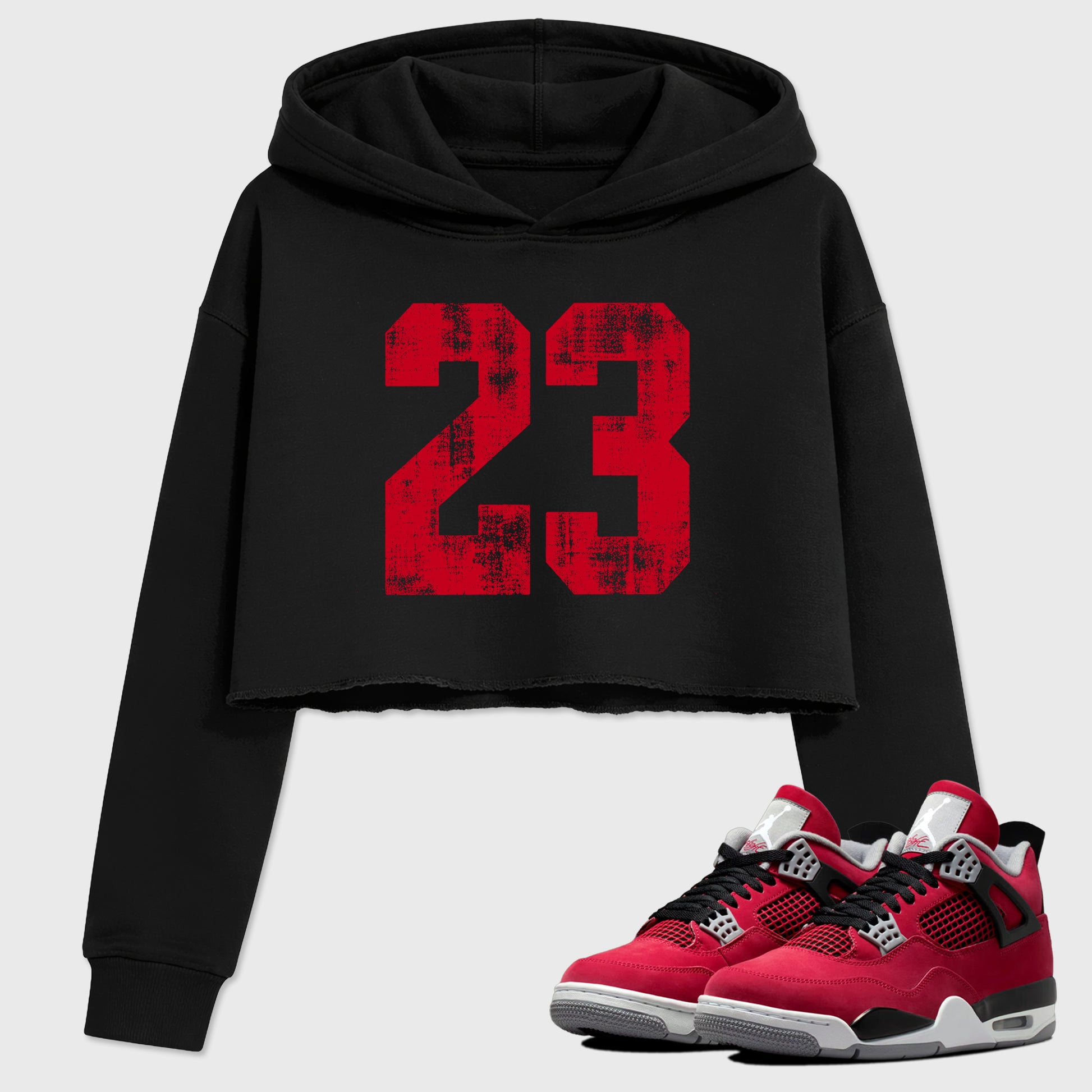 No.23 women’s crop tee designed to match the Air Jordan 4 Toro Bravo, featuring coordinated Black 1 options for a perfect streetwear vibe.