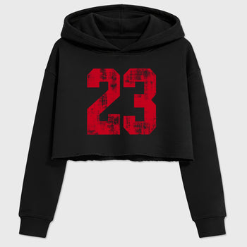 No.23 women’s crop tee designed to match the Air Jordan 4 Toro Bravo, featuring coordinated Black 2 options for a perfect streetwear vibe.
