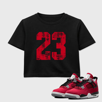 No.23 women’s crop tee designed to match the Air Jordan 4 Toro Bravo, featuring coordinated Black 1 options for a perfect streetwear vibe.