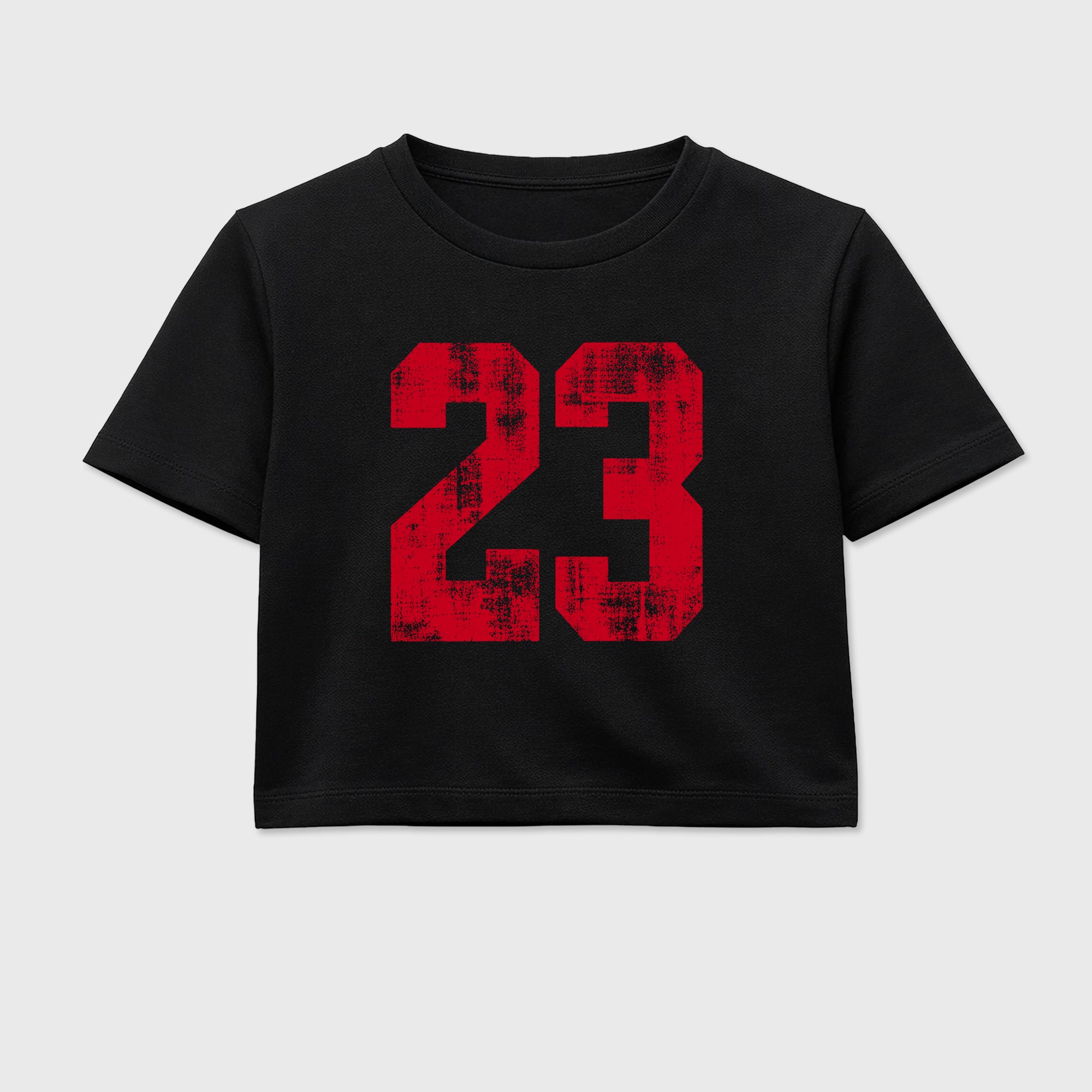 No.23 women’s crop tee designed to match the Air Jordan 4 Toro Bravo, featuring coordinated Black 2 options for a perfect streetwear vibe.