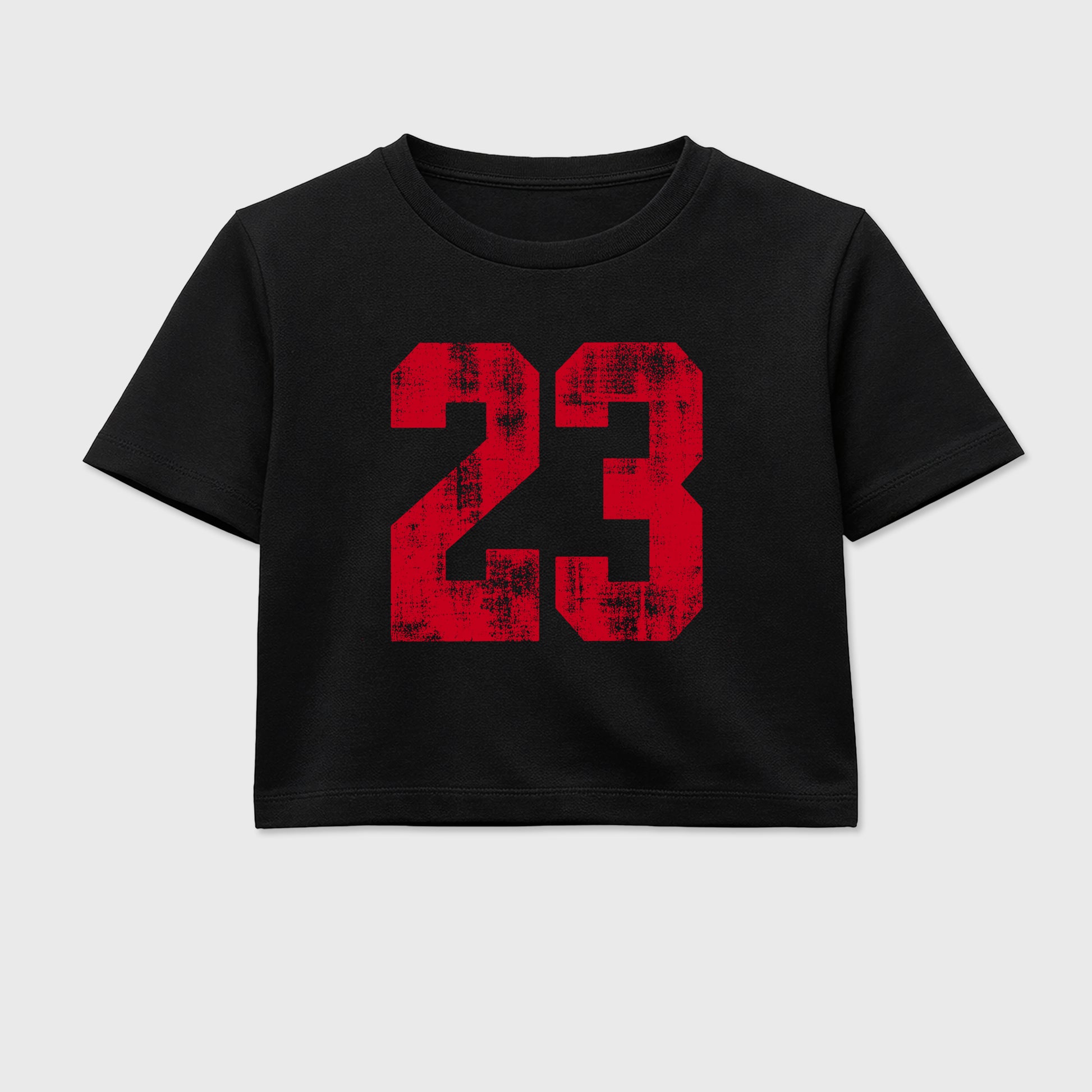 No.23 women’s crop tee designed to match the Air Jordan 4 Toro Bravo, featuring coordinated Black 2 options for a perfect streetwear vibe.