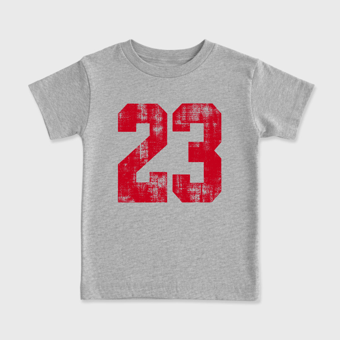 No.23 affordable baby and kids t-shirt designed to match the Air Jordan 4 Toro Bravo, featuring coordinated Heather Grey 2 options for the perfect little sneakerhead streetwear look.