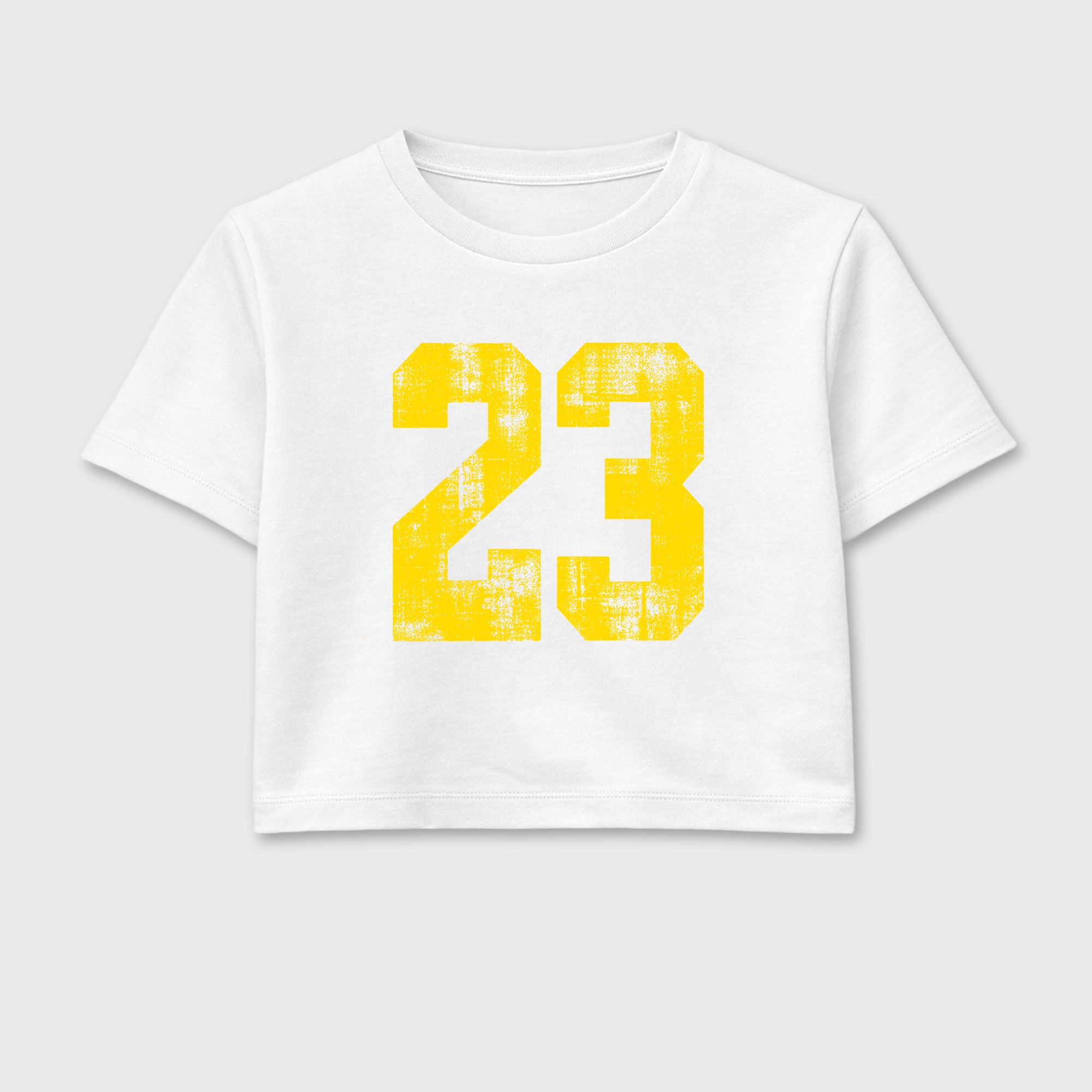 No.23 women’s crop tee designed to match the Air Jordan 4 Tour Yellow, featuring coordinated White 2 options for a perfect streetwear vibe.