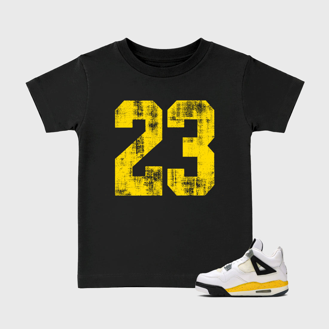 No.23 Baby & Kids Graphic T-Shirt featuring original artwork designed to match the Air Jordan 4 Tour Yellow. Black 1 Kids Graphic Tee.