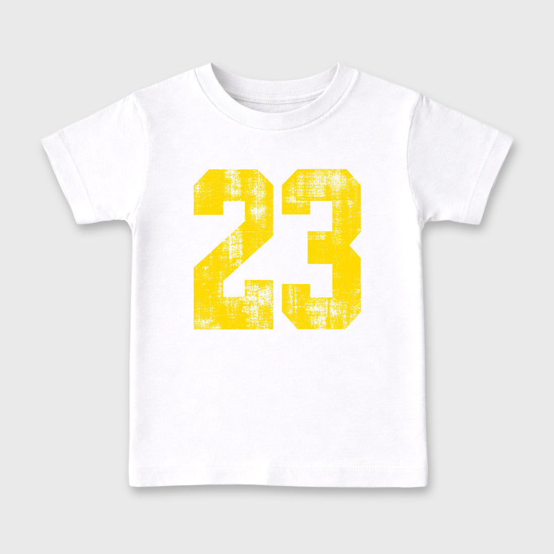 No.23 Baby & Kids Graphic T-Shirt featuring original artwork designed to match the Air Jordan 4 Tour Yellow. White 2 Kids Graphic Tee.