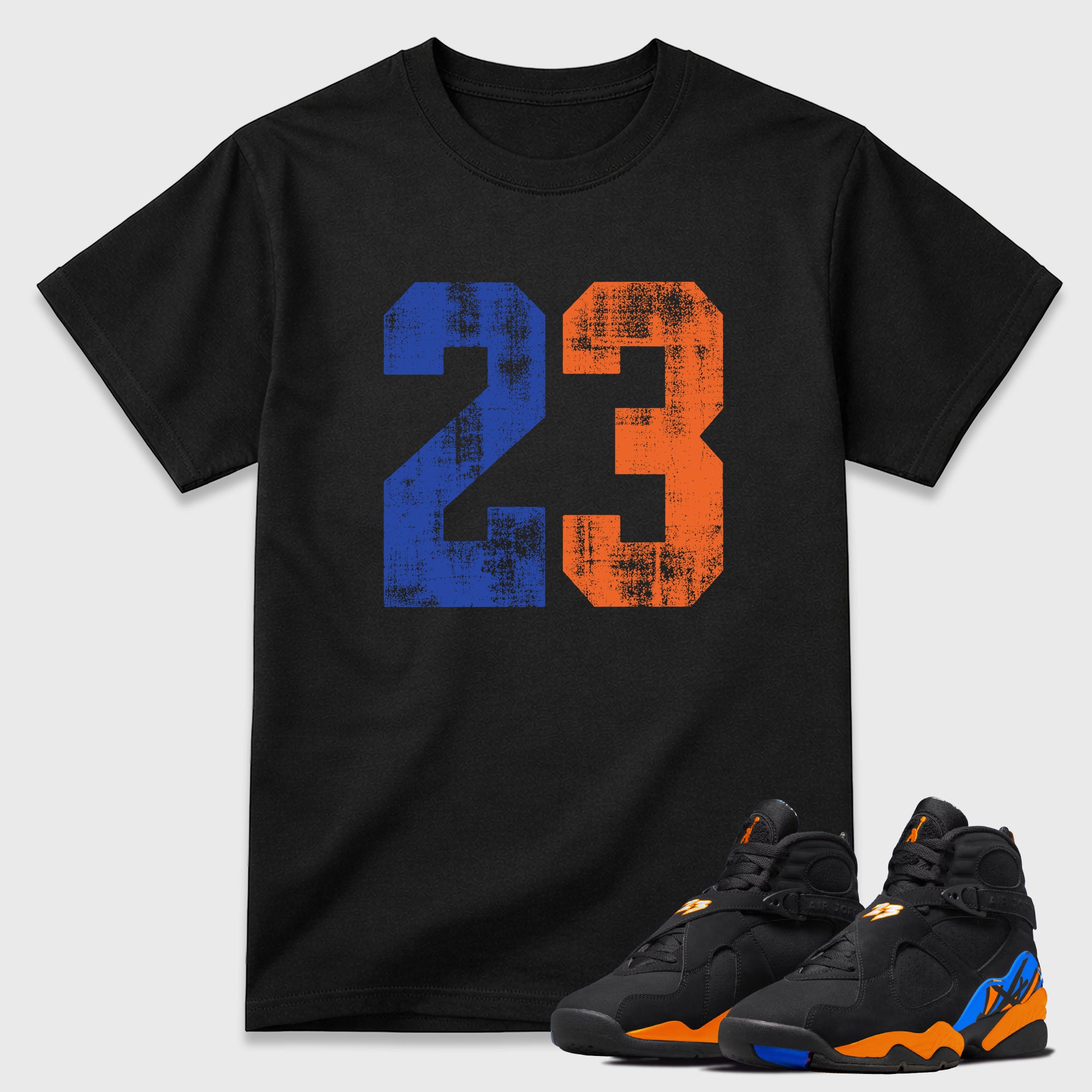 No.23 Graphic T-Shirt featuring original streetwear artwork designed to match the Air Jordan 8 Knicks. Black 1 Graphic T-Shirt.