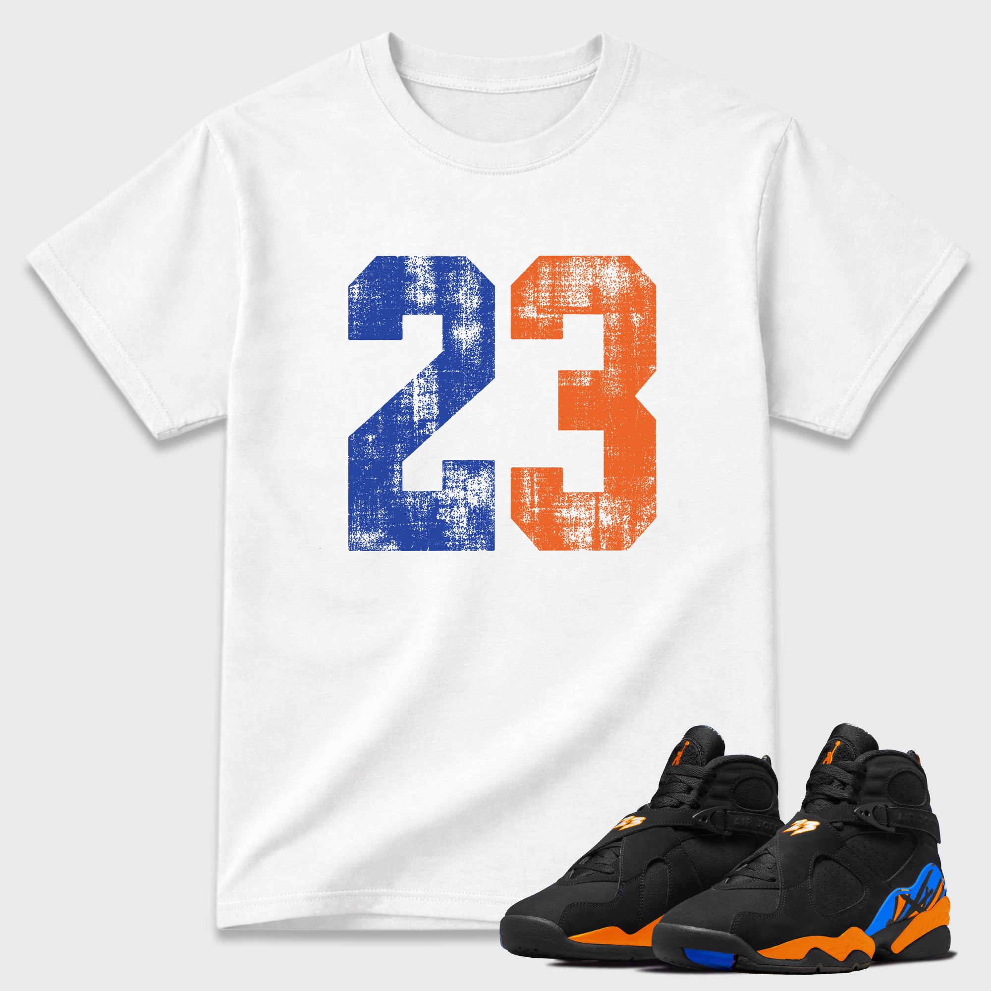 No.23 Graphic T-Shirt featuring original streetwear artwork designed to match the Air Jordan 8 Knicks. White 1 Graphic T-Shirt.