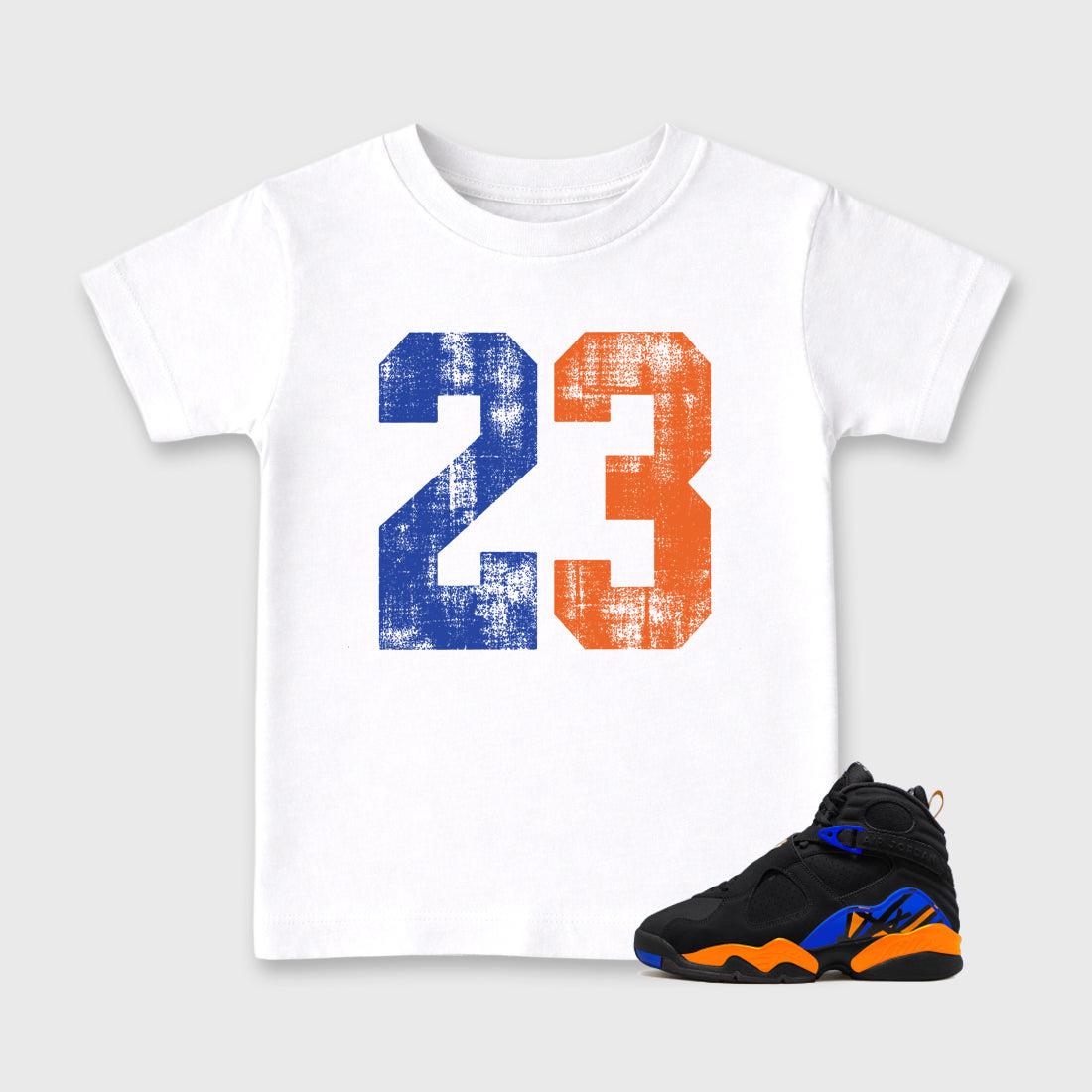 No.23 Baby & Kids Graphic T-Shirt featuring original artwork designed to match the Air Jordan 8 Knicks. White 1 Kids Graphic Tee.