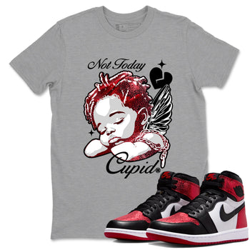 Not Today Cupid sneaker match t-shirt styled to complete your fit with the Air Jordan 1 Ruby sneakers, shown in Heather Grey 1.