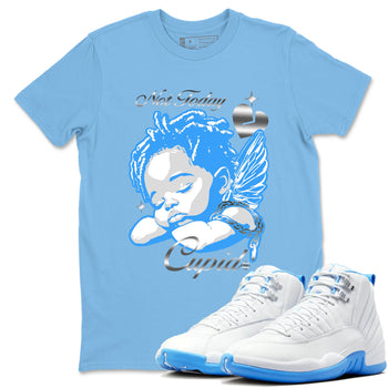 Not Today Cupid sneaker match t-shirt styled to complete your fit with the Air Jordan 12 White and University Blue sneakers, shown in Carolina Blue 1.